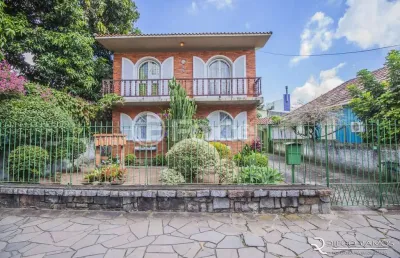 Casa com 3 quartos à venda na rua morretes, 120, santa maria goretti, porto alegre, 204 m2 por r$ 890.000