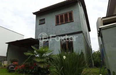 Casa em condomínio fechado com 3 quartos à venda na avenida senador salgado filho, 8500, vila augusta, viamão, 238 m2 por r$ 900.000