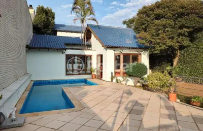 Casa com 5 quartos à venda na rua mozart, 133, três figueiras, porto alegre, 396 m2 por r$ 1.800.000