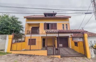 Casa com 4 quartos à venda na travessa clemêncio wallau, 24, coronel aparício borges, porto alegre, 484 m2 por r$ 780.000