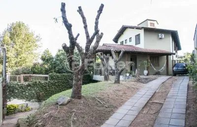 Casa com 4 quartos à venda na rua sepé tiaraju, 1159, medianeira, porto alegre, 379 m2 por r$ 1.200.000