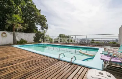 Casa com 4 quartos à venda na rua alcebíades antônio dos santos, 355, nonoai, porto alegre, 420 m2 por r$ 1.700.000