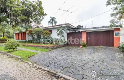 Casa com 4 quartos à venda na travessa trindade, 10, jardim lindóia, porto alegre, 252 m2 por r$ 1.080.000