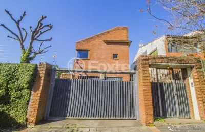 Casa com 4 quartos à venda na rua de souza júnior, 74, medianeira, porto alegre, 276 m2 por r$ 2.000.000