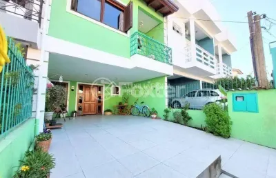 Casa em condomínio fechado com 3 quartos à venda na rua pau-brasil, 549, hípica, porto alegre, 134 m2 por r$ 500.000