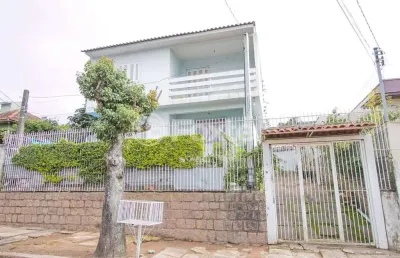 Casa com 2 quartos à venda na rua mathilde zatar, 157, nonoai, porto alegre, 135 m2 por r$ 617.000