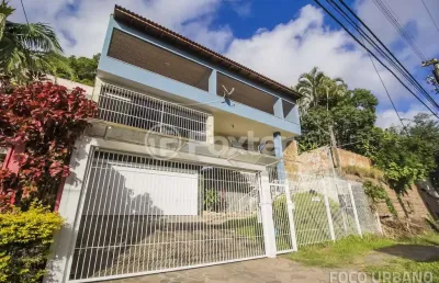 Casa com 4 quartos à venda na rua cleveland, 73, santa tereza, porto alegre, 287 m2 por r$ 931.000