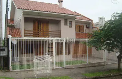Casa com 4 quartos à venda na rua dona otília, 3793, santa tereza, porto alegre, 280 m2 por r$ 1.200.000