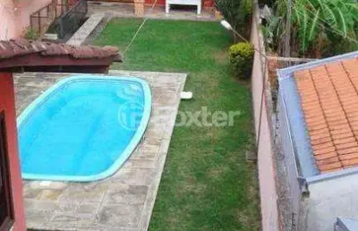 Casa com 4 quartos à venda na rua landel de moura, 2191, tristeza, porto alegre, 250 m2 por r$ 950.000
