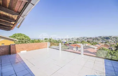 Casa com 3 quartos à venda na rua coronel ruy da cunha paim, 55, nonoai, porto alegre, 600 m2 por r$ 1.060.000