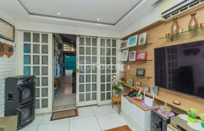 Casa com 3 quartos à venda na avenida maceió, 350, medianeira, porto alegre, 216 m2 por r$ 850.000