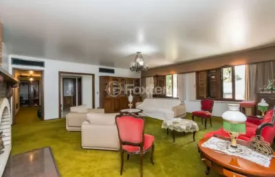 Casa com 4 quartos à venda na rua omagua, 68, vila assunção, porto alegre, 563 m2 por r$ 2.870.000