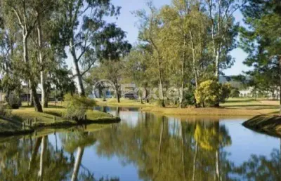 Terreno em condomínio fechado à venda na avenida juca batista, 8000, belém novo, porto alegre, 1012 m2 por r$ 500.000