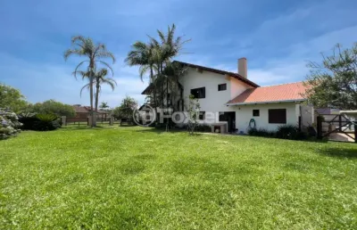 Casa com 4 quartos à venda na rua rio da várzea, 1325, centro, xangri-lá, 353 m2 por r$ 2.250.000