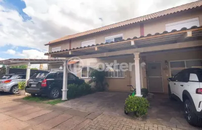Casa em condomínio fechado com 2 quartos à venda na rua treze de maio, 630, rio branco, canoas, 103 m2 por r$ 330.000