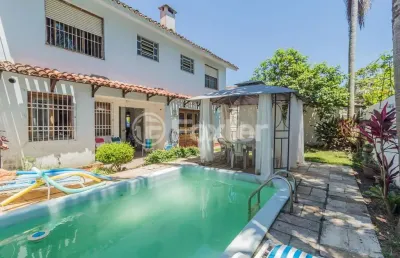 Casa com 4 quartos à venda na rua doutor raul moreira, 354, cristal, porto alegre, 180 m2 por r$ 1.200.000