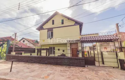 Casa com 9 quartos à venda na rua oscar tollens, 249, santa tereza, porto alegre, 334 m2 por r$ 680.000