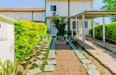 Casa com 2 quartos à venda na avenida juca batista, 3527, hípica, porto alegre, 127 m2 por r$ 304.000