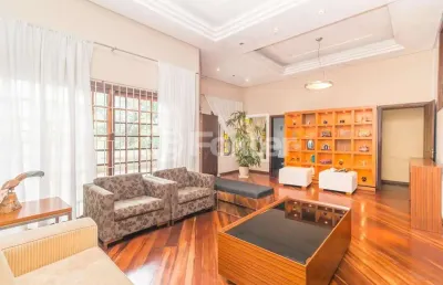 Casa com 4 quartos à venda na avenida fábio araújo santos, 1472, nonoai, porto alegre, 353 m2 por r$ 874.000