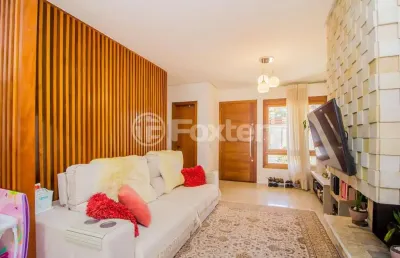 Casa em condomínio fechado com 3 quartos à venda na rua angico, 13, hípica, porto alegre, 117 m2 por r$ 610.000