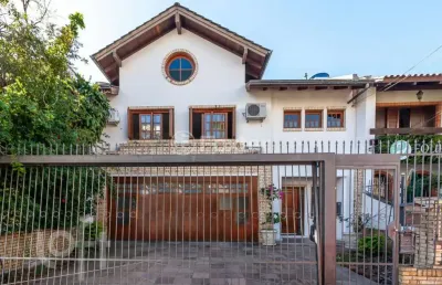 Casa com 4 quartos à venda na rua roque gonzales, 126, jardim botânico, porto alegre, 300 m2 por r$ 1.499.000