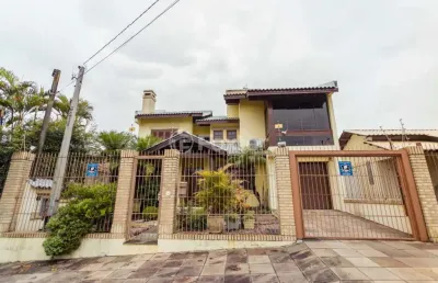 Casa com 4 quartos à venda na travessa porto príncipe, 59, jardim lindóia, porto alegre, 306 m2 por r$ 1.650.000