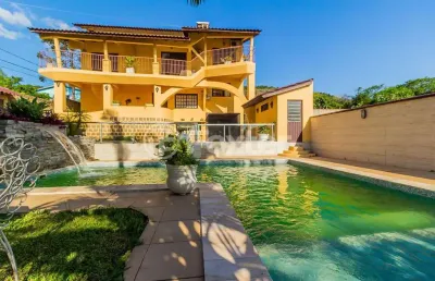 Casa com 4 quartos à venda na rua maurílio ferreira, 320, campo novo, porto alegre, 320 m2 por r$ 1.850.000