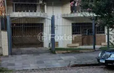Casa com 4 quartos à venda na rua professor guerreiro lima, 1010, partenon, porto alegre, 389 m2 por r$ 1.100.000