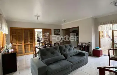 Casa com 3 quartos à venda na rua mário totta, 501, americana, alvorada, 110 m2 por r$ 650.000