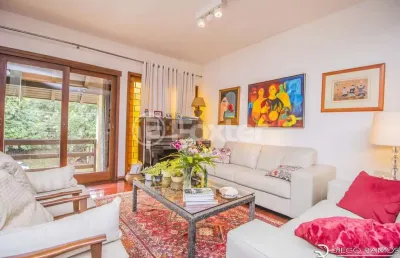 Casa com 4 quartos à venda na rua desembargador hugo candal, 140, três figueiras, porto alegre, 366 m2 por r$ 2.090.000