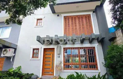 Casa em condomínio fechado com 4 quartos à venda na rua joão do couto, 201, belém velho, porto alegre, 200 m2 por r$ 674.500
