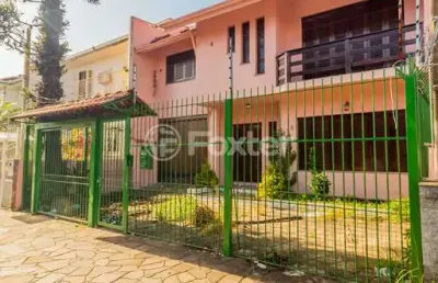 Casa com 5 quartos à venda na rua monteiro lobato, 395, partenon, porto alegre, 381 m2 por r$ 1.600.000