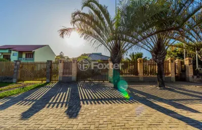 Casa com 3 quartos à venda na avenida inácio antônio da silva, 608, belém novo, porto alegre, 200 m2 por r$ 1.200.000