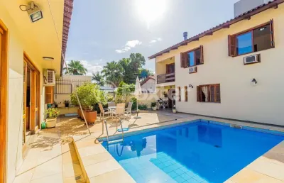 Casa com 5 quartos à venda na avenida pereira passos, 239, vila assunção, porto alegre, 392 m2 por r$ 2.320.000