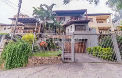 Casa com 6 quartos à venda na rua fernando abbott, 1055, cristo redentor, porto alegre, 431 m2 por r$ 1.230.000
