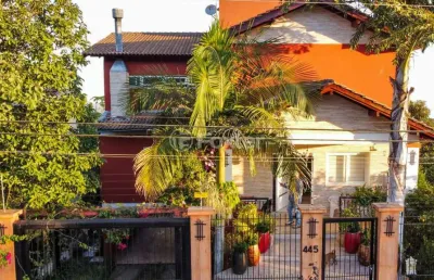 Casa com 4 quartos à venda na rua dona lida monteiro, 445, teresópolis, porto alegre, 440 m2 por r$ 1.539.000