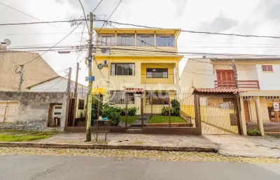 Casa com 6 quartos à venda na rua monte arraes, 232, nonoai, porto alegre, 256 m2 por r$ 800.000