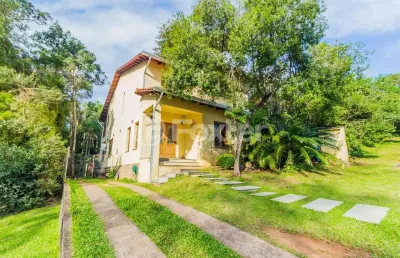 Casa em condomínio fechado com 3 quartos à venda na avenida senador salgado filho, 8500, querência, viamão, 207 m2 por r$ 1.125.000