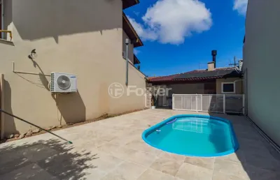 Casa com 3 quartos à venda na rua guatambu, 331, hípica, porto alegre, 210 m2 por r$ 1.045.000
