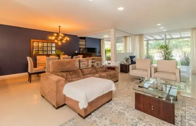 Casa em condomínio fechado com 4 quartos à venda na avenida juca batista, 8000, chapéu do sol, porto alegre, 297 m2 por r$ 1.850.000