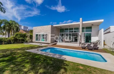 Casa em condomínio fechado com 4 quartos à venda na avenida juca batista, 8000, chapéu do sol, porto alegre, 421 m2 por r$ 3.200.000
