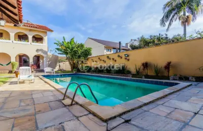 Casa com 6 quartos à venda na rua paulo blaschke, 670, jardim itu sabará, porto alegre, 546 m2 por r$ 1.650.000