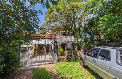 Casa com 5 quartos à venda na avenida vicente monteggia, 2231, cavalhada, porto alegre, 308 m2 por r$ 905.000