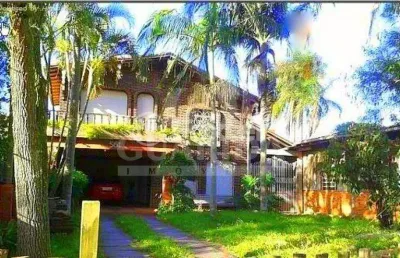 Casa com 3 quartos à venda na estrada joão vedana, 561, cavalhada, porto alegre, 200 m2 por r$ 905.000