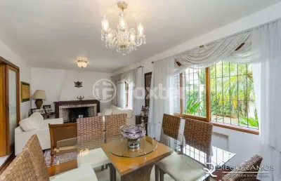 Casa com 3 quartos à venda na rua luiz voelcker, 740, três figueiras, porto alegre, 322 m2 por r$ 1.790.000