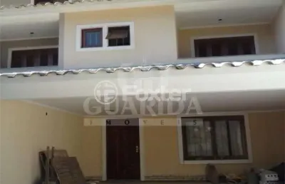 Casa com 3 quartos à venda na rua doutor egydio michaelsen, 180, cavalhada, porto alegre, 186 m2 por r$ 650.000