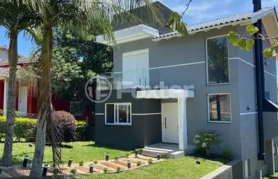 Casa em condomínio fechado com 3 quartos à venda na estrada capitão gentil machado de godoy, 4500, vila elsa, viamão, 200 m2 por r$ 1.250.000