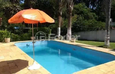 Casa com 3 quartos à venda na praça apiaca, 136, espírito santo, porto alegre, 106 m2 por r$ 960.000