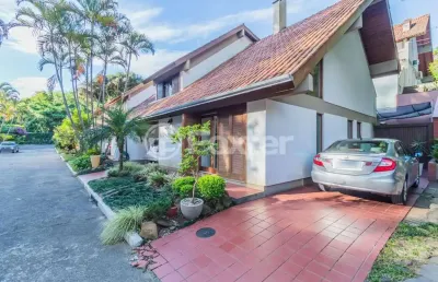 Casa em condomínio fechado com 4 quartos à venda na rua dea coufal, 1380, cavalhada, porto alegre, 233 m2 por r$ 1.387.000