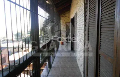Casa com 3 quartos à venda na avenida capivari, 1104, cristal, porto alegre, 270 m2 por r$ 647.000